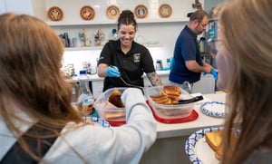 Military-affiliated students being served lunch